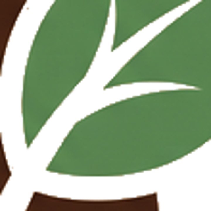 Close-up of an AI-generated logo: soft edges, pixel steps and paper grain